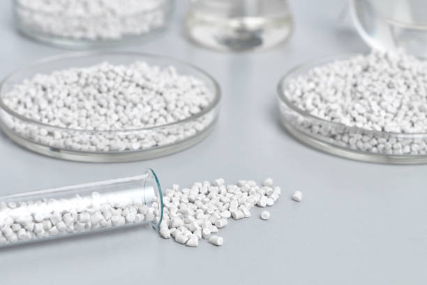 istock Closeup of glass flasks with granules 1148783431