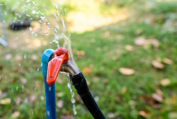 Rural faucet with water leaking in plantation