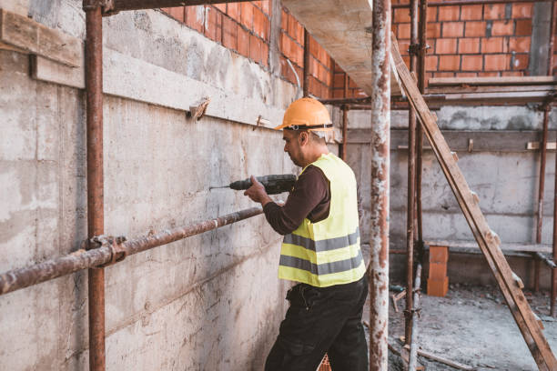 istock Skilled Maintenance Worker at the Workplace with his Building Tools 1148789158