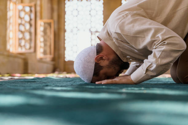istock Muslim man is praying in mosque 1148790317