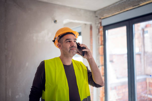 istock Building Worker at the Construction Yard in Communication 1148790674