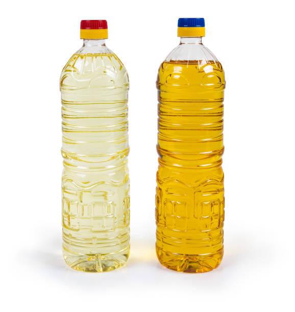 istock Unrefined cold-pressed and refined sunflower oil in two bottles 1148792033