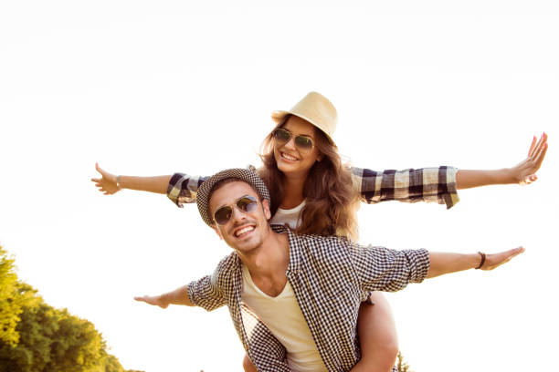 istock Happy young man piggybacking his girlfriend. 1148793777