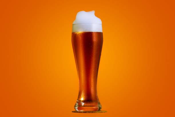 istock Golden beer in glass with foam, alcohol beverage,  copyspace. 1148794166