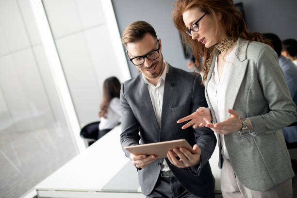 istock Group of business people collaborating in office 1148794842