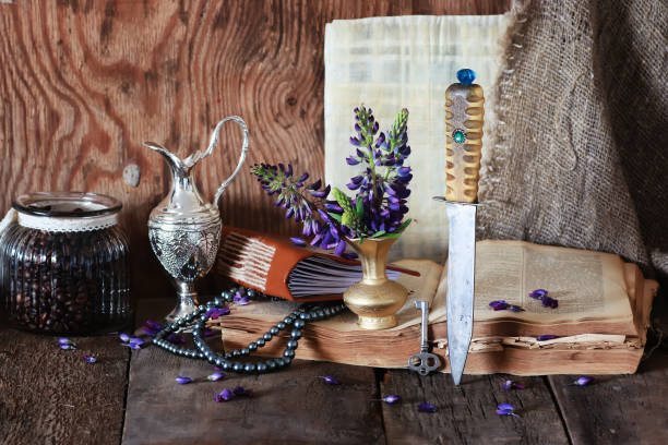 istock Arab book flower and knife 1148794858