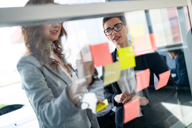 istock Group of architects and business people working together 1148794866