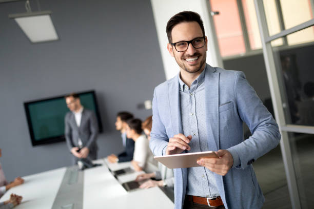 istock Group of business people collaborating in office 1148794907