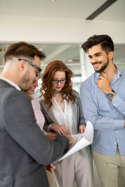 istock Group of architects and business people working together 1148794967
