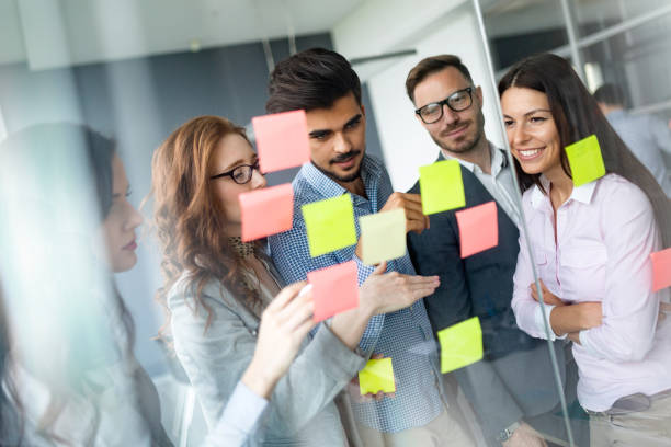 istock Group of architects and business people working together 1148795122