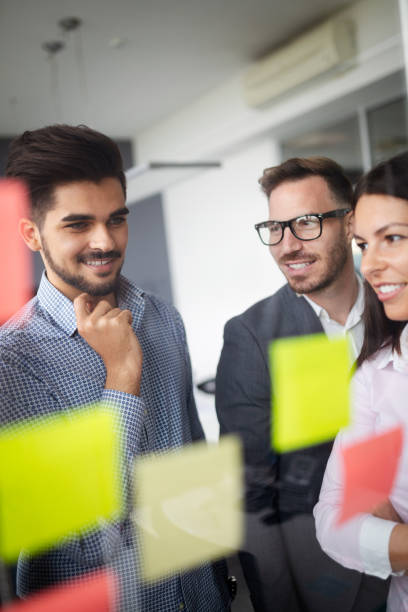 istock Collaboration and analysis by business people working in office 1148795131