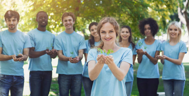 istock Group of volunteer with trees for growing 1148796687