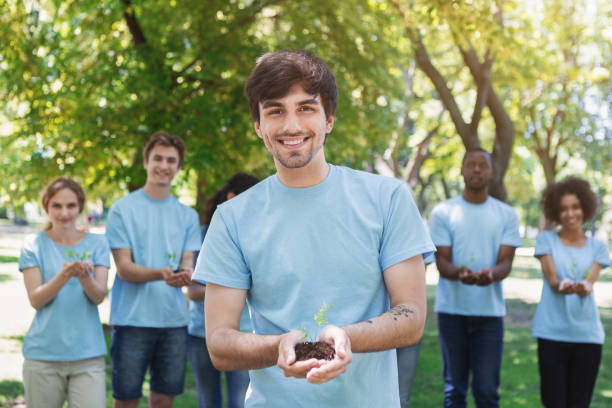 istock Group of volunteer with trees for growing 1148796695