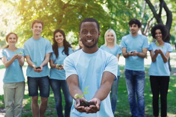istock Group of volunteer with trees for growing 1148796701