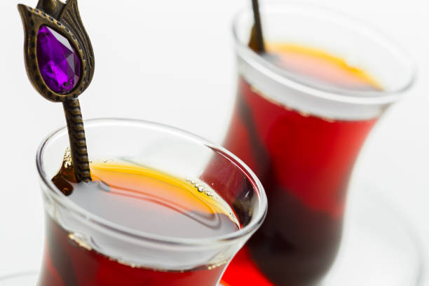 istock Turkish tea in traditional glass isolated on white background 1148796758