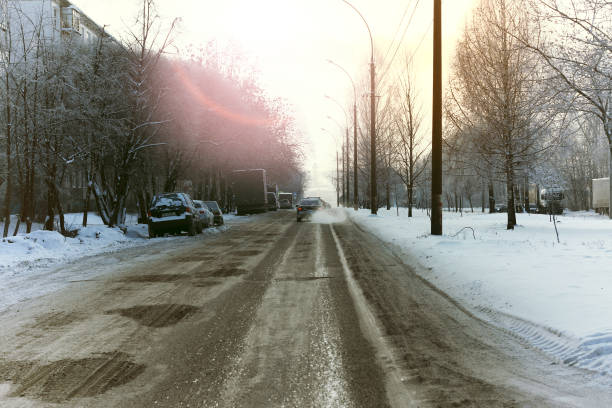 istock road city car winter 1148796853