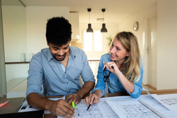 istock Business People and architects working on project together 1148796984