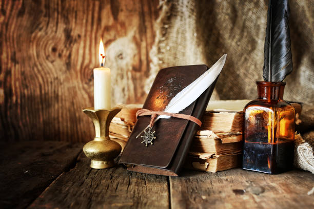 istock diary and feather with a bottle of rum 1148798712