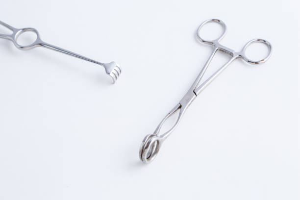 istock surgical instruments on white isolated background. top view 1148799438