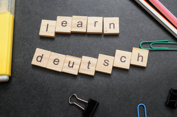 istock Word LEARN DEUTSCH written on wood block. 1148799973