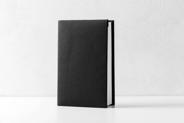 istock pile of paperback books on a table 1148802766
