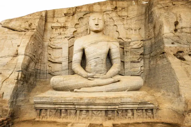 Stunning view of the beautiful Samadhi statue carved in stone. The Samadhi Statue is a statue situated at Mahamevnawa Park in Anuradhapura, Sri Lanka.