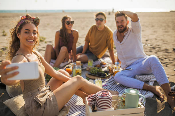 istock Pleasant beach picnic with my friends 1148805746