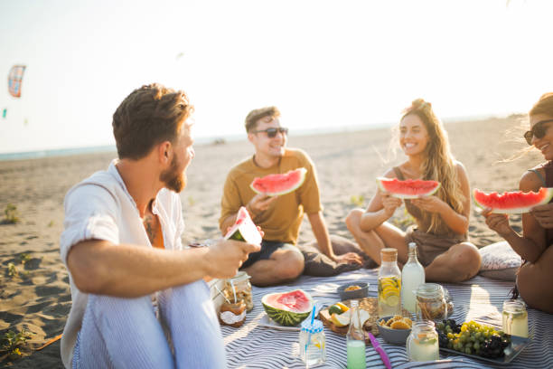 istock Pleasant beach picnic with my friends 1148808920