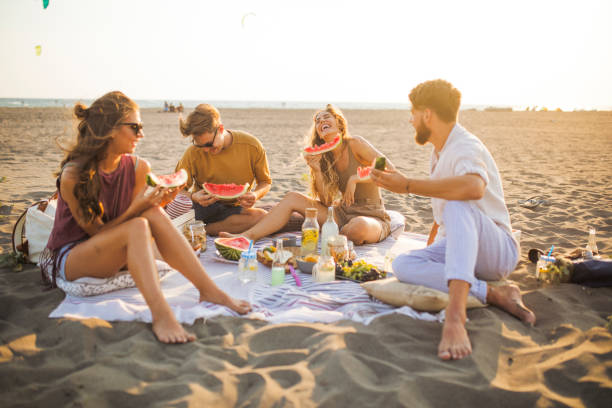 istock Pleasant beach picnic with my friends 1148809468