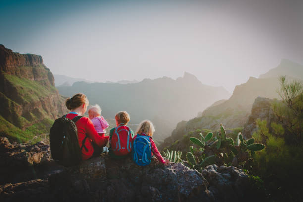 istock mother with three kids hiking in mountains 1148809509