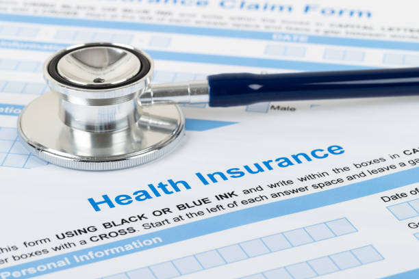 istock Health insurance application form with stethoscope and calculator 1148815891
