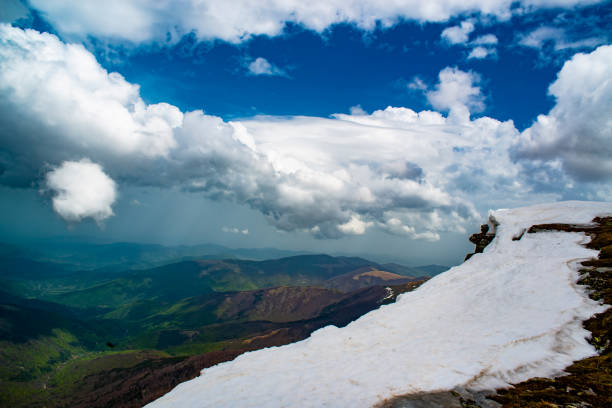 Beautiful landscape with hills, snow  and blue sky of Eastern Serbia