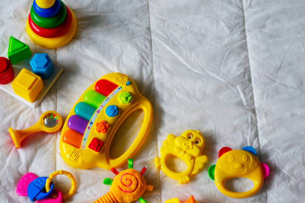 istock Kids bright colorful toys frame on white background. Top view. Flat lay. Copy space for text 1148817576