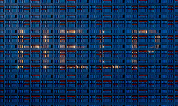 istock the word Help written with enlighten windows of a dark skyscraper 1148820385