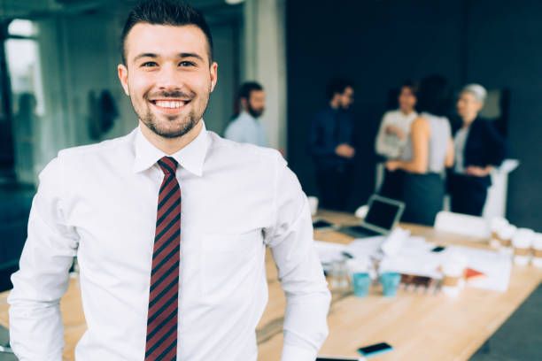 istock Businessman with his team behind 1148820920