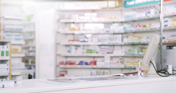 Anything you need is here Shot of shelves stocked with various medicinal products in a pharmacy chemist stock pictures, royalty-free photos & images