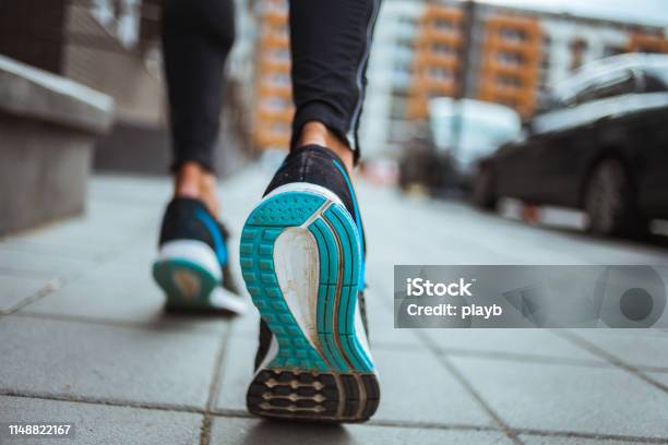 Close Up Shot Of Runners Shoes Stock Photo - Download Image Now - Walking, Sports Shoe, Exercising