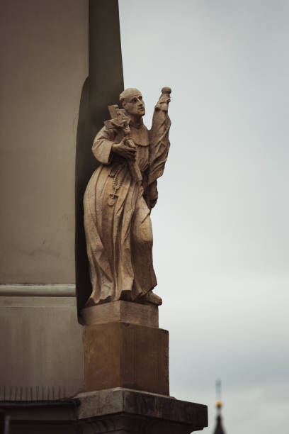 istock Statue on ancient catholic church in Poland 1148823772