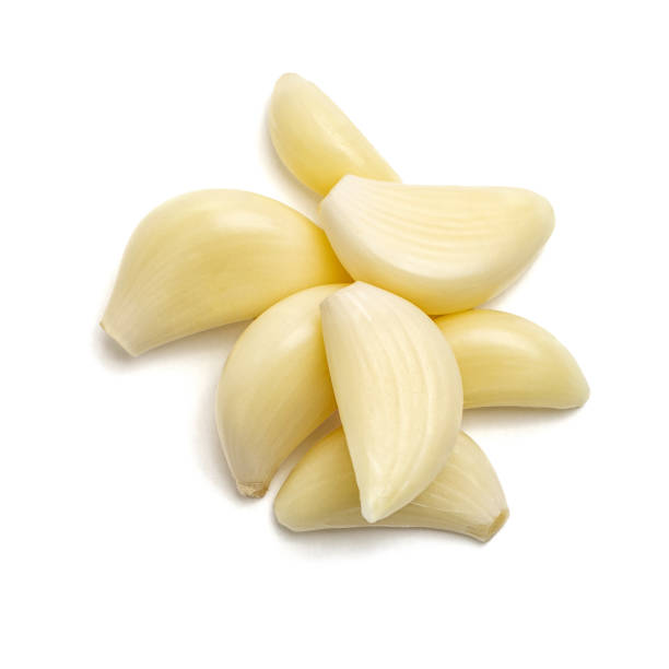 Isolated garlic. Raw garlic segment isolated on white background. To view stock photo