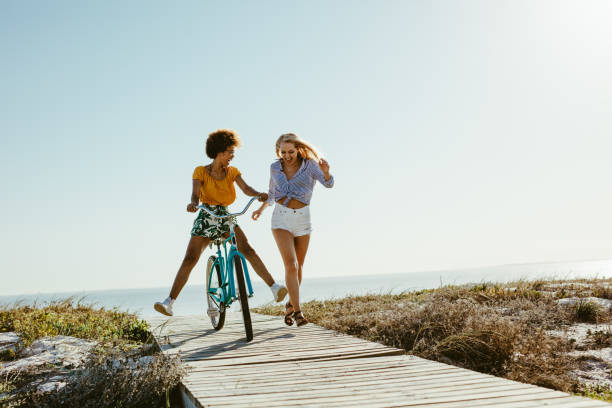 14,200+ 2 Friends Riding Bikes Stock Photos, Pictures & Royalty-Free Images  - iStock