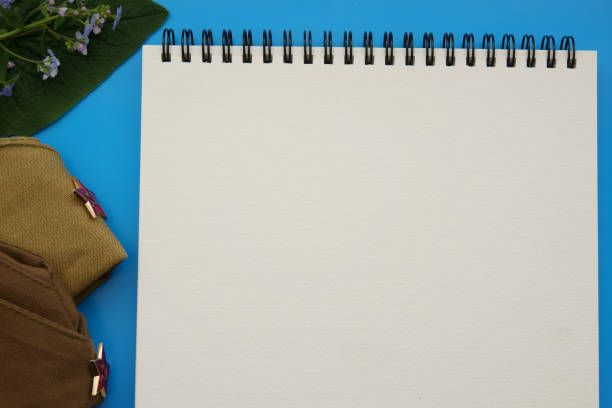 istock white form for records on a blue background with forget-me-nots. theme of war. victory. memory 1148826688