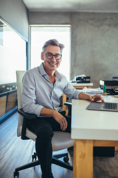 istock Mature businessman at his desk 1148826844