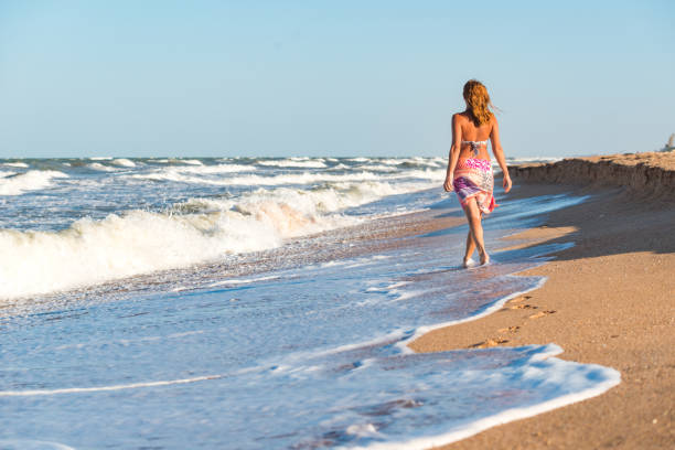 istock Woman enjoying a stormy wind 1148828714