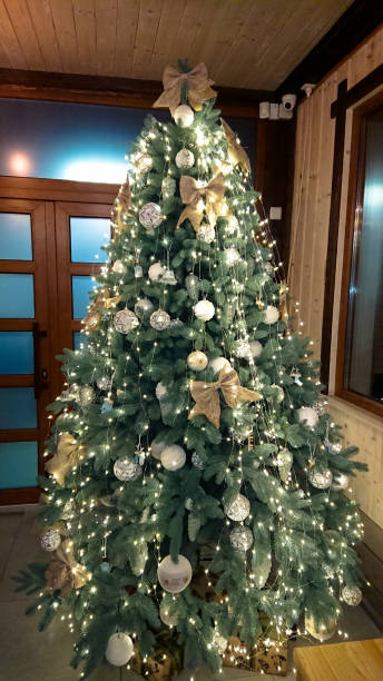 istock Beautifully decorated Christmas tree. Holiday background. 1148828965