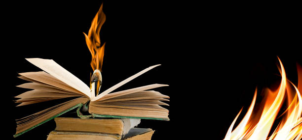 istock image of a burning book closeup 1148836027