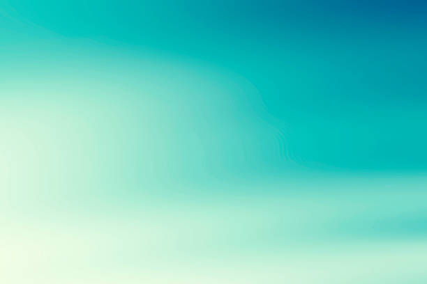明るい青のデフォーカスは動きの抽象的な背景をぼかした - turquoise ストックフォトと画像