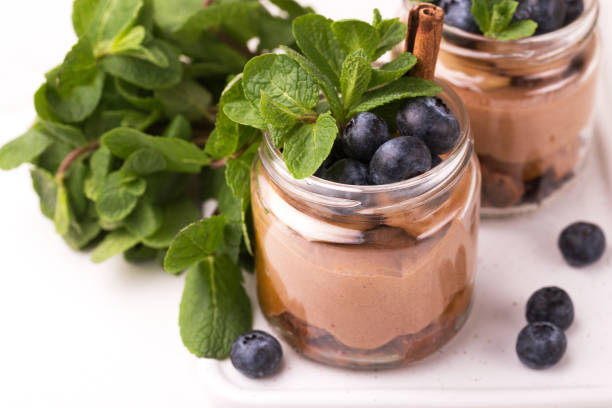 istock Cake dessert. Chocolate mousse with blueberry, mint and cinnamon 1148837263