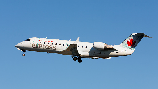 Halifax Stanfield International Airport, Canada - May 21, 2015: Air Canada Express Bombardier CRJ-200ER, C-FZJA. Air Canada Express is a regional airline for Air Canada.