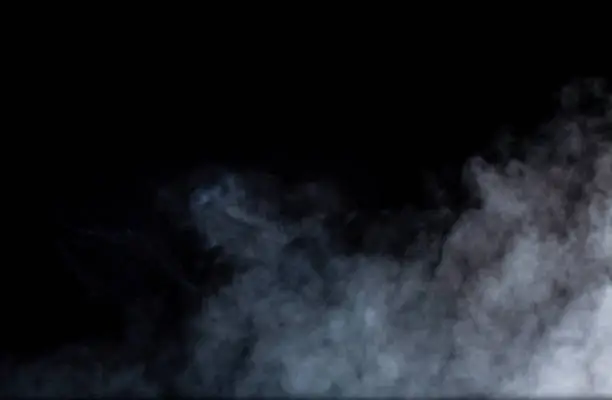 Photo of Smoke or fog steam set on black color background . Hazy steam curls for decorative special effect . Cigarette fumes or dry ice Smoking design.