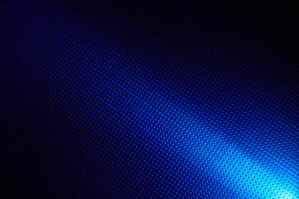 istock Diagonal bright beam of light on a blue background to the point 1148838505